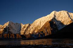 45 Pemthang Karpo Ri At Sunrise From Shishapangma Southwest Advanced Base Camp Pemthang Karpo Ri (6830m, also called Dome Blanc) shines at sunrise from Shishapangma Southwest Advanced Base Camp.